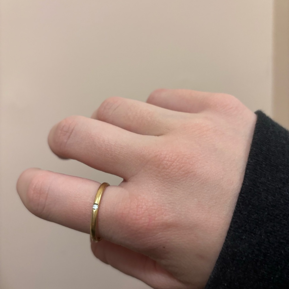 Pomellato Elegant Gold Ring with Diamond Accent